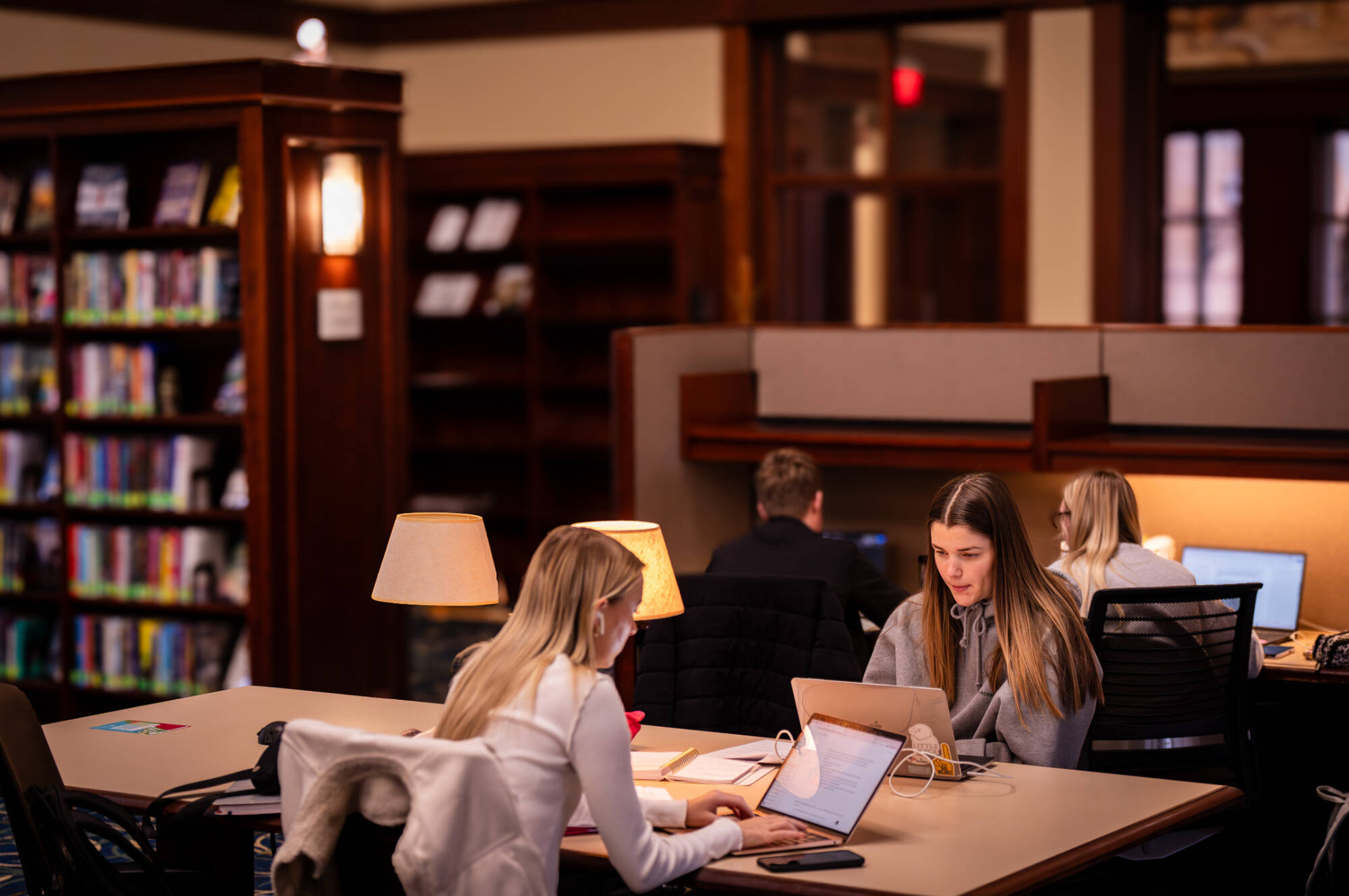 Seniors Lauren Gould (left) and Jenna Richardson study inside the Steelcase Library inside the Richard M. DeVos Center on the Robert C. Pew Grand Rapids Campus. Gould is an accounting major and Richardson is a Marketing/Management major. 2025-11-11. Ph...